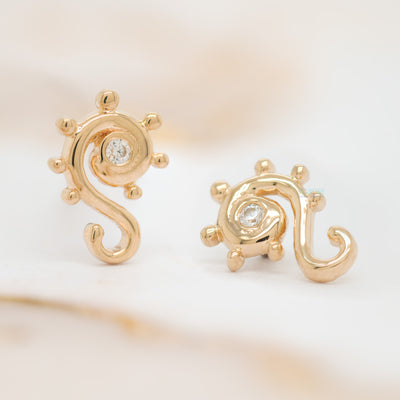 "Dots & Swirls" in Gold Threaded End with White CZ