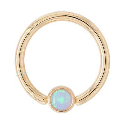 Captive Bead Ring (CBR) in Gold with Bezel-set Baby Blue Opal Captive Bead