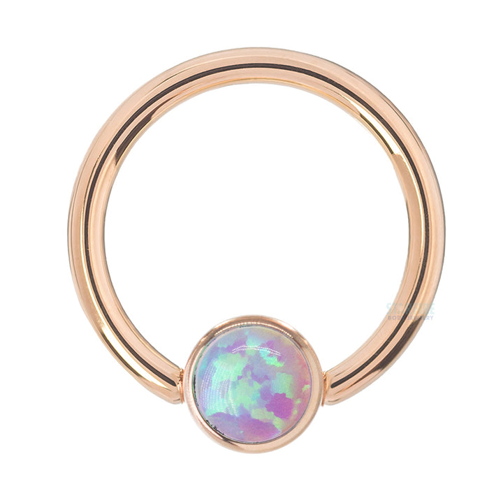 Captive Bead Ring (CBR) in Gold with Bezel-set Pink Opal Captive Bead
