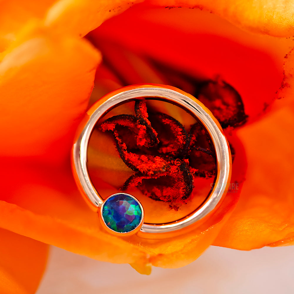 Gold Captive Bead Ring (CBR) with Bezel-set Faceted Black Opal Captive Bead