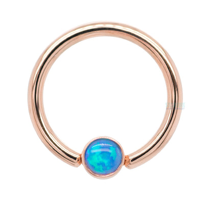 Captive Bead Ring (CBR) in Gold with Bezel-set Sky Blue Opal Captive Bead