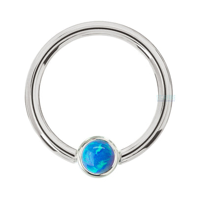 Captive Bead Ring (CBR) in Gold with Bezel-set Sky Blue Opal Captive Bead
