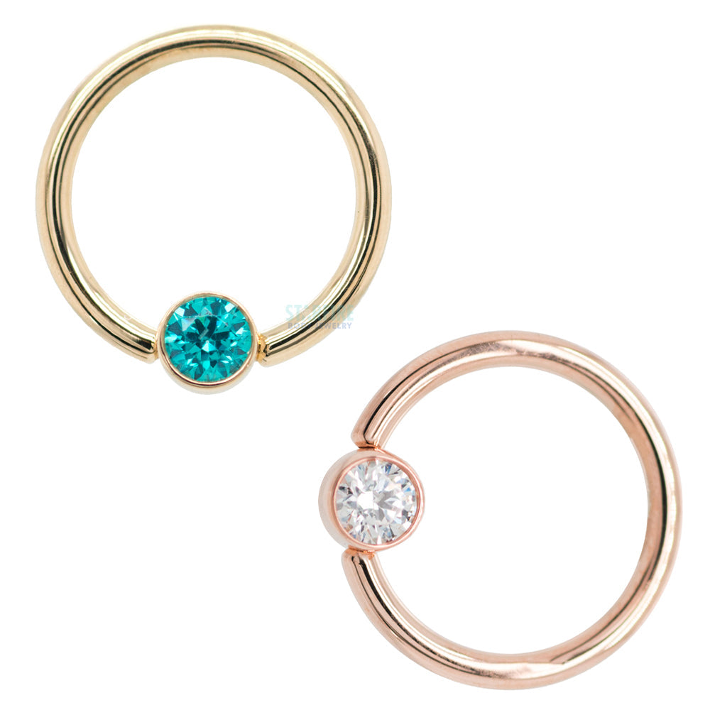 Captive Bead Ring (CBR) in Gold with Bezel-set Synthetic Tanzanite Captive Bead