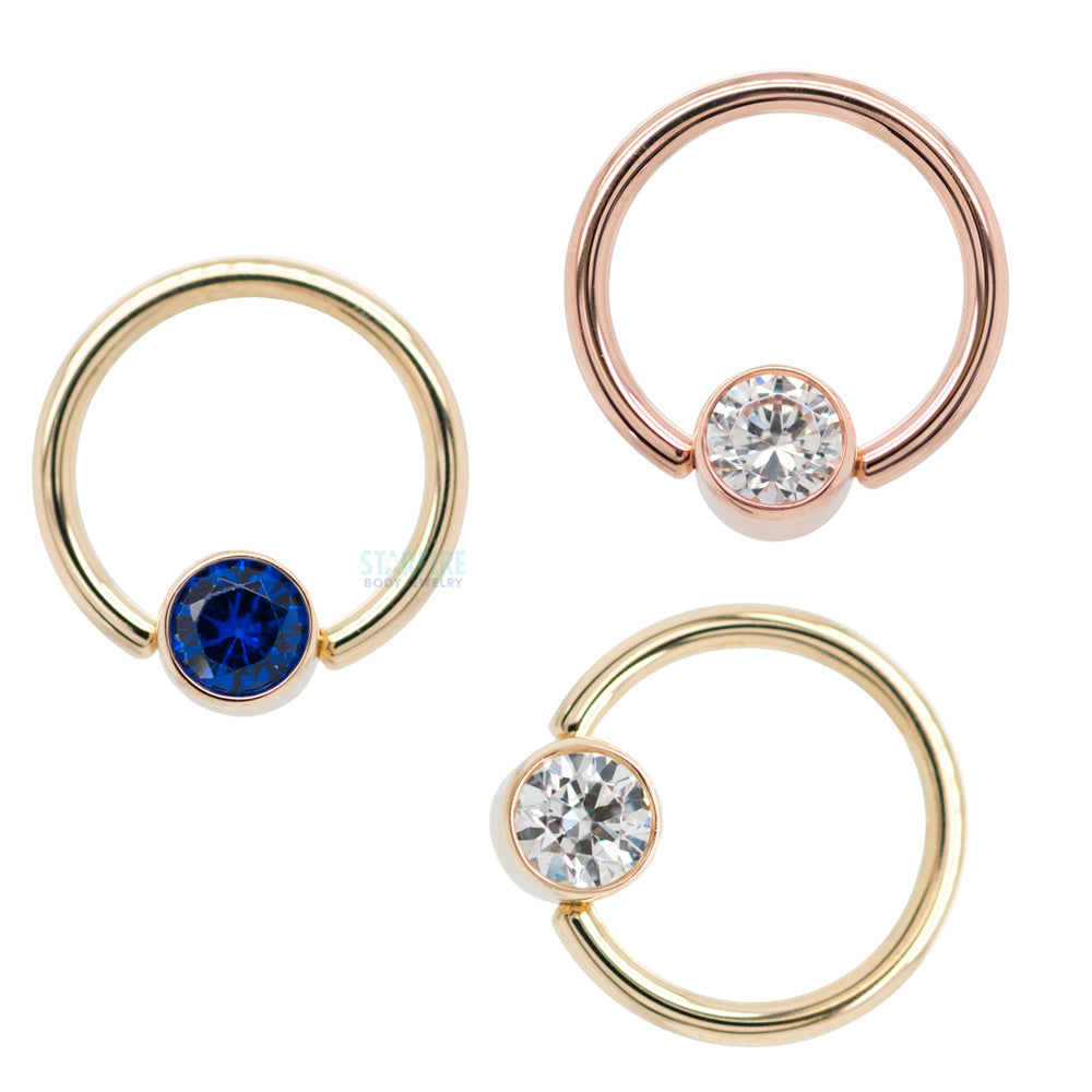 Captive Bead Ring (CBR) in Gold with Bezel-set Synthetic Ruby Captive Bead