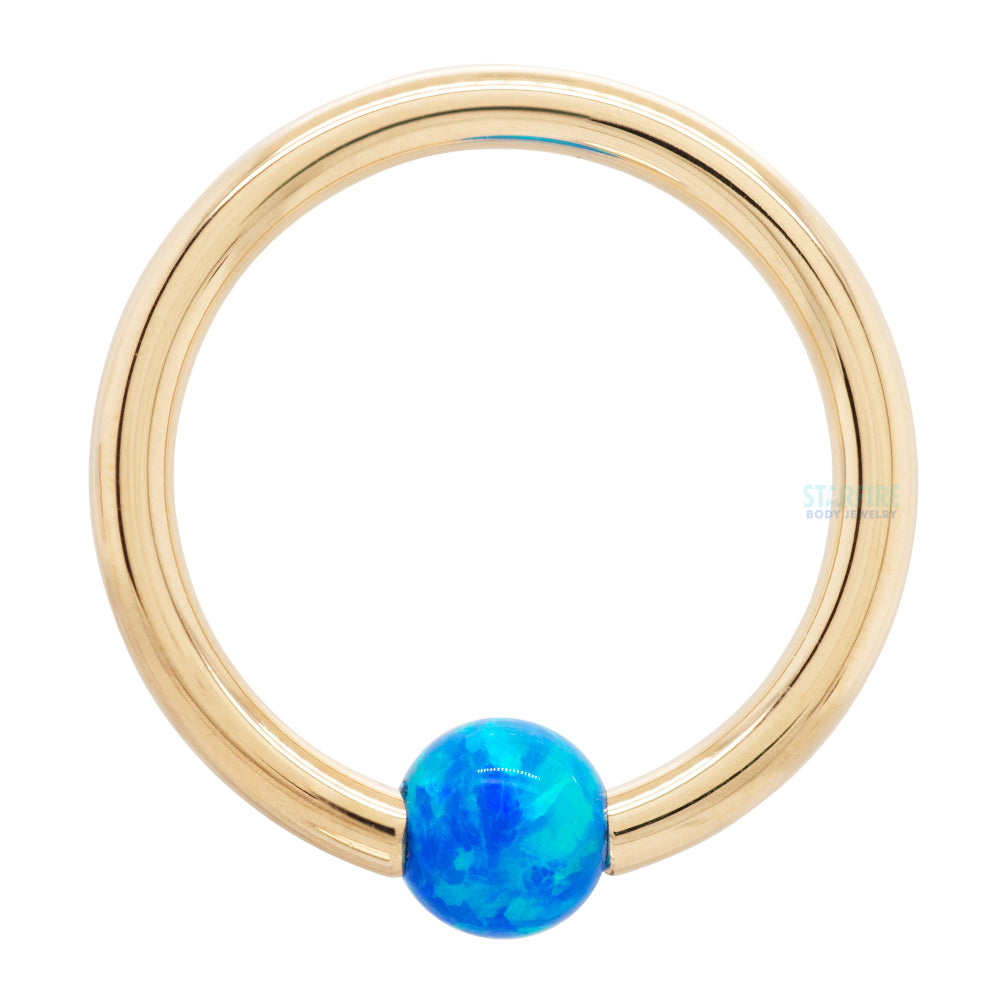 Captive Bead Ring (CBR) in Gold with Sky Blue Opal Captive Bead