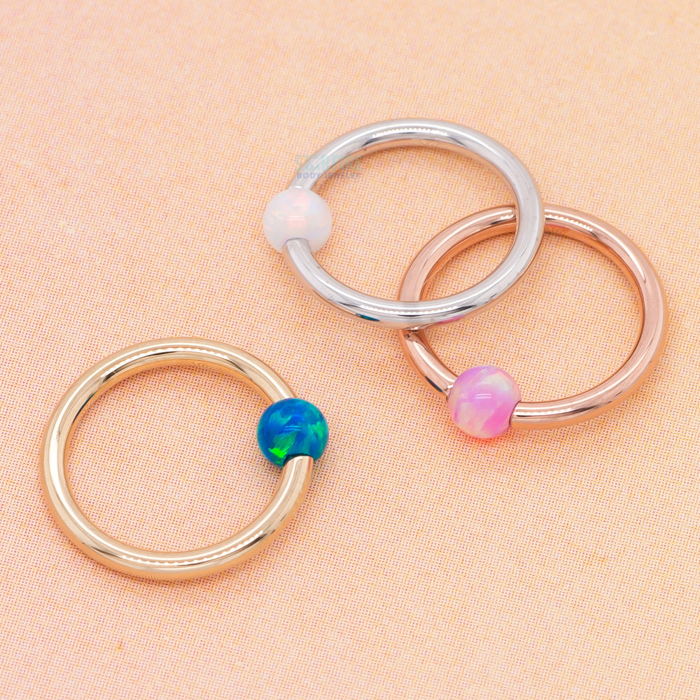 Captive Bead Ring (CBR) in Gold with Baby Blue Opal Captive Bead