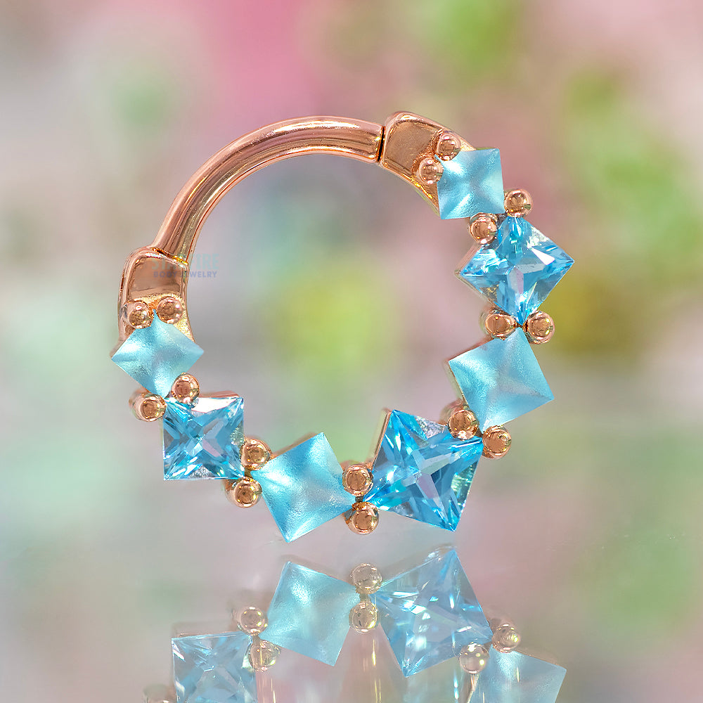 Graduating Tiffany Hinge Ring in Gold with Swiss Blue Topaz with Alternating Sandblasted Gems