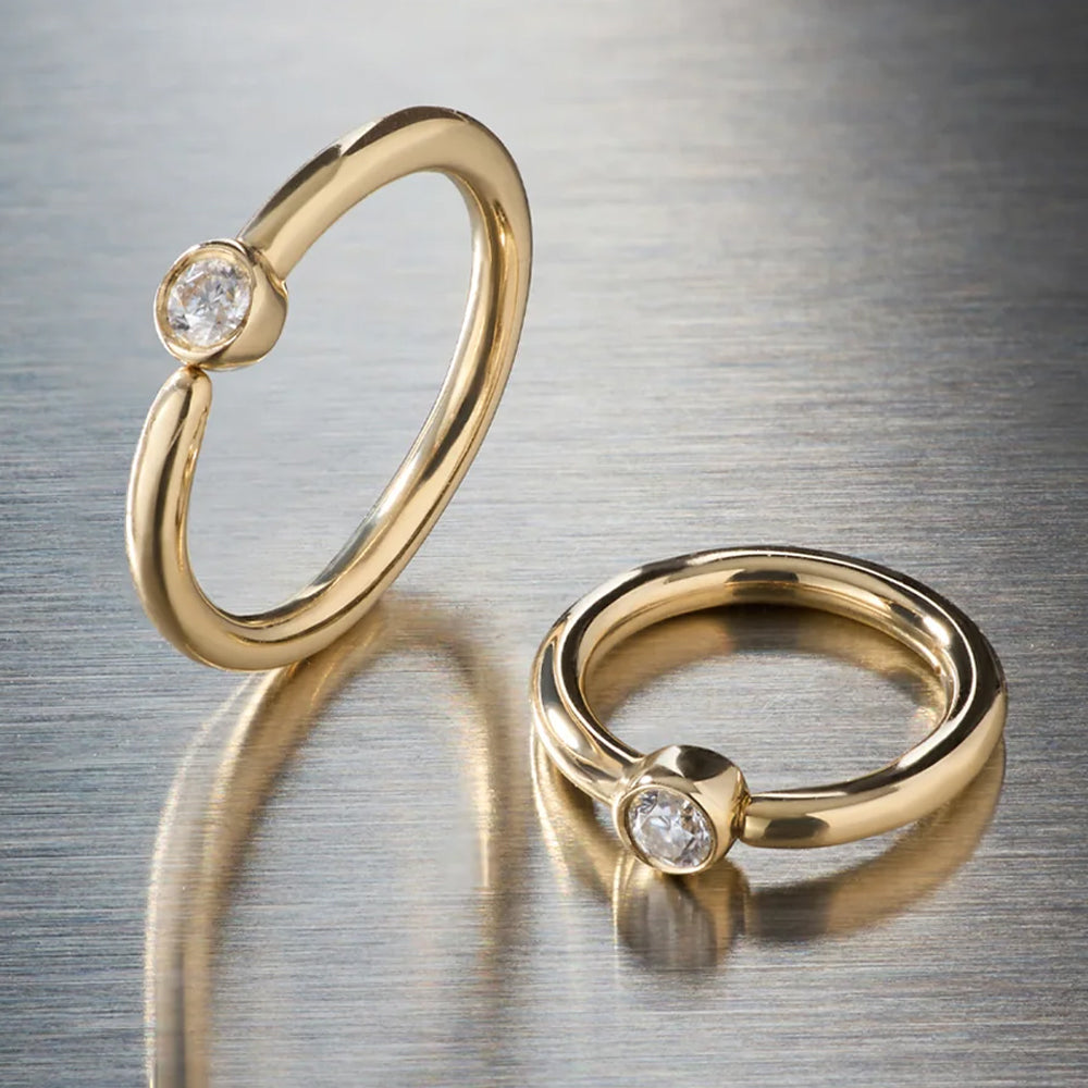 Fixed Bezel Seam Ring in Gold with Moissanite