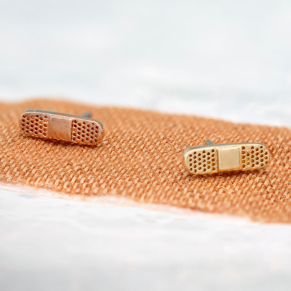 threadless: "Ouch" Pin in Gold