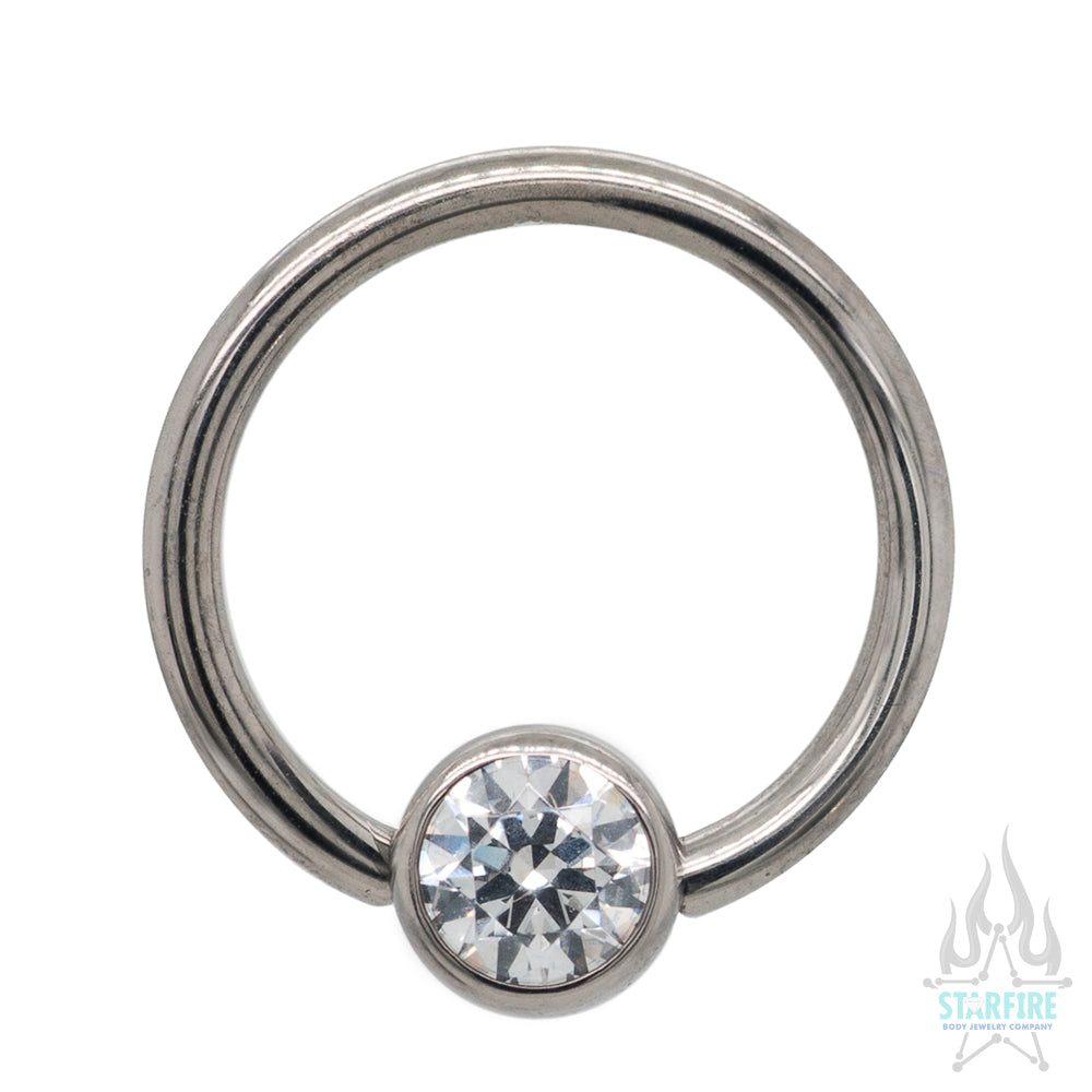 Captive Bead Ring (CBR) with Bezel-Set Faceted Gem
