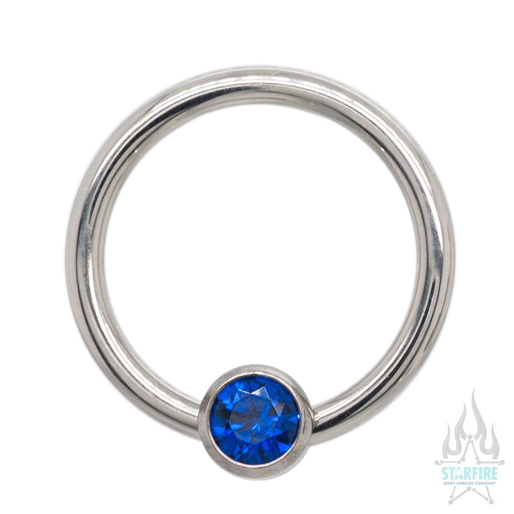 Captive Bead Ring (CBR) with Bezel-Set Faceted Gem
