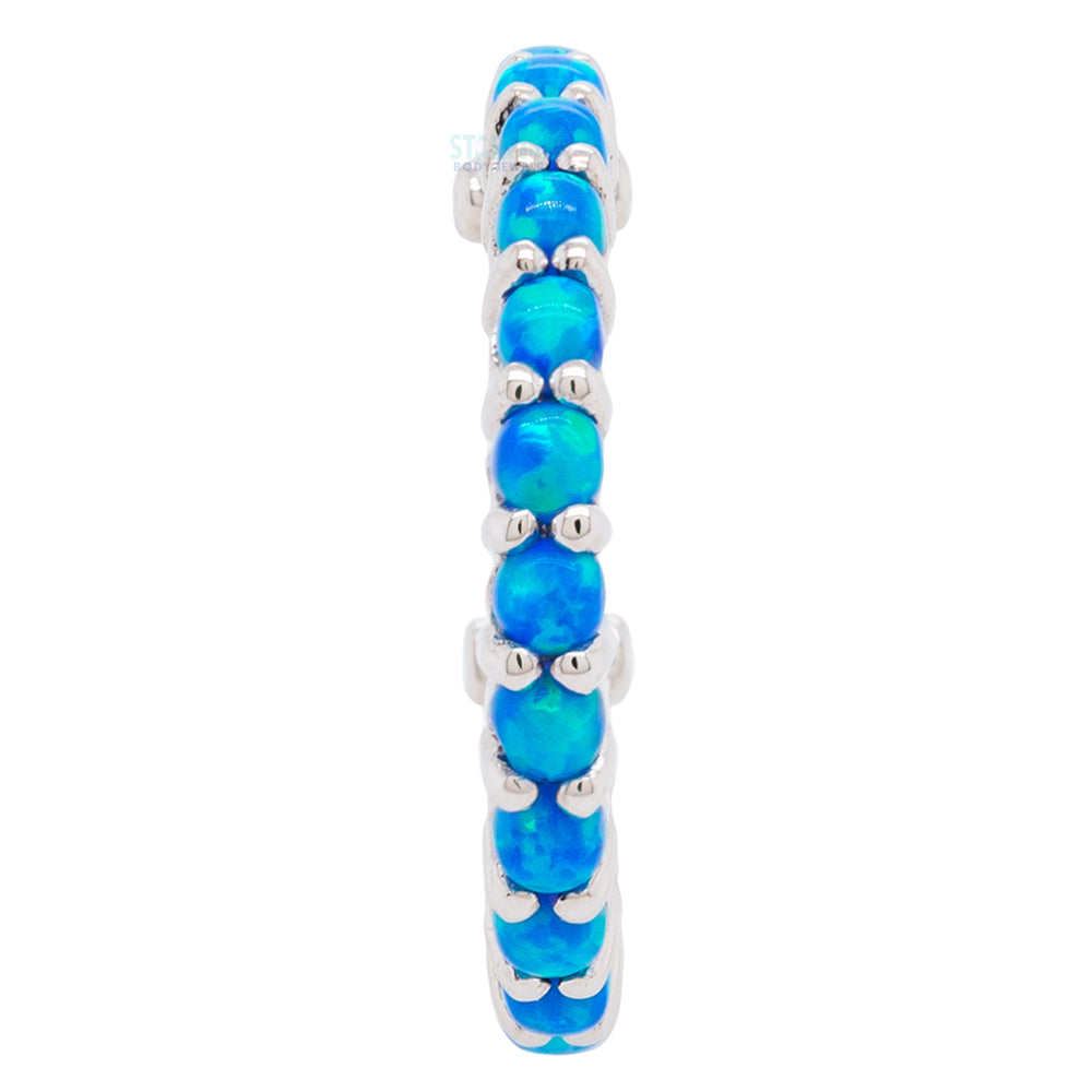 "Telesto" Hinge Ring in Gold with Sky Blue Opals
